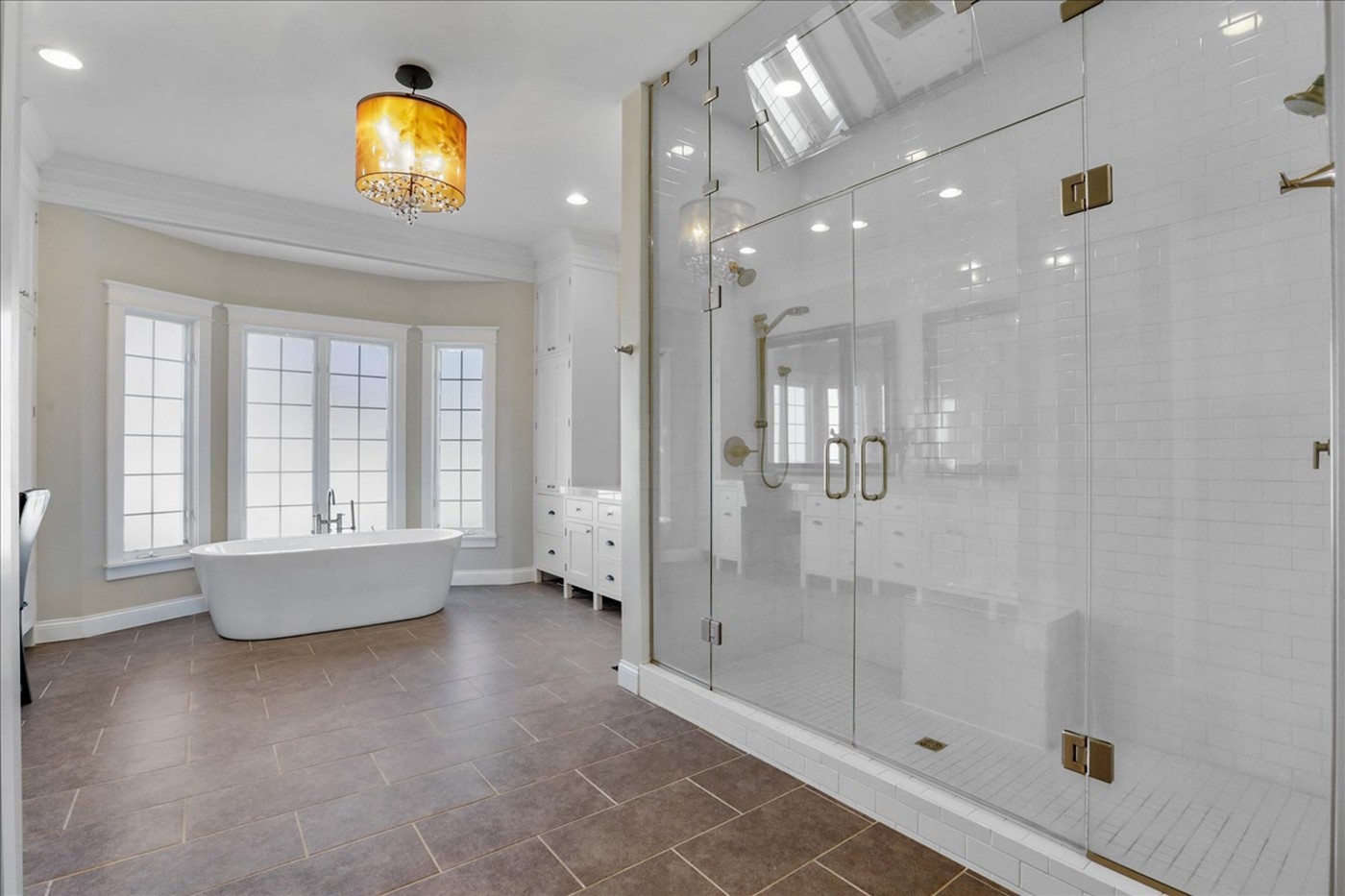 Longwood primary bath with freestanding tub and glass shower